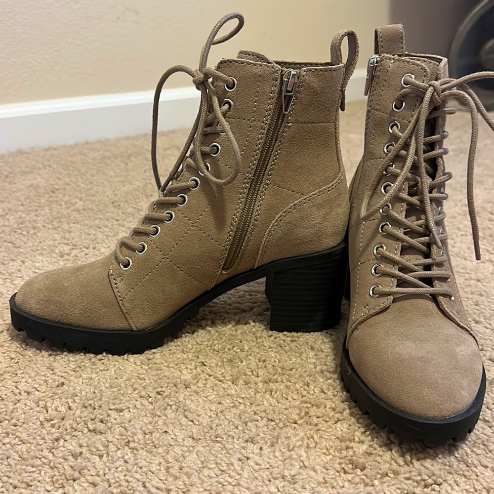 Tan high heeled boots